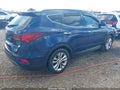 2017 Hyundai Santa Fe — photo 4 of 17 | VIN 5XYZU4LA0HG501273