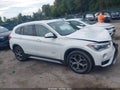 2016 BMW X1 — photo 13 of 15 | VIN WBXHT3C33G5E52917