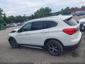 2016 BMW X1 — photo 14 of 15 | VIN WBXHT3C33G5E52917