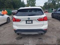 2016 BMW X1 — photo 15 of 15 | VIN WBXHT3C33G5E52917