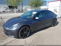 2021 Tesla Model 3 — photo 2 of 15 | VIN 5YJ3E1EB6MF847904