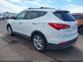 2014 Hyundai Santa Fe — photo 3 of 18 | VIN 5XYZU3LA2EG175160