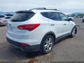 2014 Hyundai Santa Fe — photo 4 of 18 | VIN 5XYZU3LA2EG175160