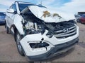 2014 Hyundai Santa Fe — photo 6 of 18 | VIN 5XYZU3LA2EG175160