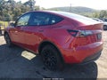 2023 Tesla Model Y — photo 3 of 11 | VIN 7SAYGDEE8PA150041