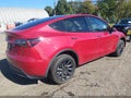 2023 Tesla Model Y — photo 4 of 11 | VIN 7SAYGDEE8PA150041