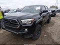 2018 Toyota Tacoma — photo 2 of 18 | VIN 3TMCZ5AN5JM151764