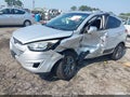 2014 Hyundai Tucson — photo 2 of 16 | VIN KM8JUCAG0EU830902