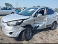 2014 Hyundai Tucson — photo 6 of 16 | VIN KM8JUCAG0EU830902