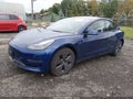 2023 Tesla Model 3 — photo 2 of 10 | VIN 5YJ3E1EA2PF653477