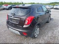 2015 Buick Encore — photo 4 of 15 | VIN KL4CJGSBXFB211019