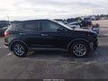 2014 Hyundai Santa Fe — photo 14 of 17 | VIN 5XYZU3LAXEG132878