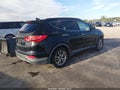 2014 Hyundai Santa Fe — photo 4 of 17 | VIN 5XYZU3LAXEG132878