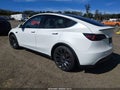 2023 Tesla Model Y — photo 3 of 10 | VIN 7SAYGDEF8PF841100