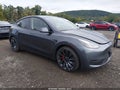 2023 Tesla Model Y — photo 1 of 11 | VIN 7SAYGDEF7PF824885