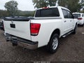 2015 Nissan Titan — photo 4 of 16 | VIN 1N6AA0ECXFN507808