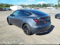 2023 Tesla Model Y — photo 3 of 10 | VIN 7SAYGDEE9PF889969