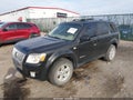 2008 Mercury Mariner — photo 2 of 16 | VIN 4M2CU39H18KJ35638