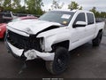2018 Chevrolet Silverado 1500 — photo 2 of 16 | VIN 3GCUKREC2JG429897