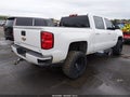 2018 Chevrolet Silverado 1500 — photo 4 of 16 | VIN 3GCUKREC2JG429897