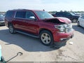 2016 Chevrolet Suburban — photo 1 of 15 | VIN 1GNSCJKC1GR372179