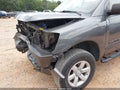 2011 Nissan Titan — photo 12 of 13 | VIN 1N6BA0ED1BN317760