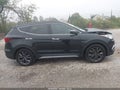2017 Hyundai Santa Fe — photo 13 of 16 | VIN 5XYZWDLA9HG477629