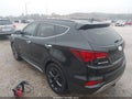 2017 Hyundai Santa Fe — photo 3 of 16 | VIN 5XYZWDLA9HG477629