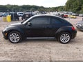 2013 Volkswagen Beetle — photo 14 of 16 | VIN 3VWJX7AT4DM639662