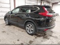 2017 Honda CR-V — photo 3 of 17 | VIN 5J6RW2H5XHL044660