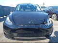 2022 Tesla Model Y — photo 11 of 15 | VIN 7SAYGDEE0NF307741