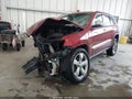 2012 Jeep Grand Cherokee — photo 2 of 15 | VIN 1C4RJFCG6CC241127