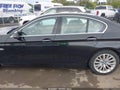 2014 BMW 5 Series — photo 14 of 16 | VIN WBA5A7C57ED616911