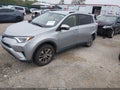 2018 Toyota RAV4 Hybrid — photo 2 of 16 | VIN JTMRJREV8JD257639