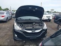 2012 Hyundai Tucson — photo 10 of 11 | VIN KM8JUCACXCU481841