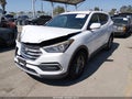 2018 Hyundai Santa Fe — photo 2 of 18 | VIN 5XYZT3LBXJG563033