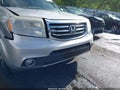 2012 Honda Pilot — photo 18 of 21 | VIN 5FNYF4H90CB031685