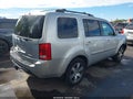 2012 Honda Pilot — photo 4 of 21 | VIN 5FNYF4H90CB031685