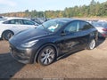 2022 Tesla Model Y — photo 2 of 18 | VIN 7SAYGDEEXNF307133