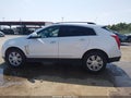 2016 Cadillac SRX — photo 14 of 16 | VIN 3GYFNAE3XGS517193