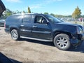 2007 GMC Yukon XL — photo 13 of 16 | VIN 1GKFK668X7J333853