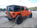 2018 Jeep Wrangler Unlimited — photo 4 of 16 | VIN 1C4HJXFN7JW215028
