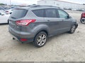 2013 Ford Escape — photo 4 of 18 | VIN 1FMCU9H95DUD74946