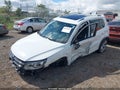 2015 Volkswagen Tiguan — photo 2 of 16 | VIN WVGBV7AX7FW522009