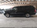 2011 Chevrolet Suburban — photo 14 of 20 | VIN 1GNSCKE04BR184319