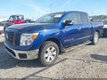 2019 Nissan Titan — photo 2 of 16 | VIN 1N6AA1E55KN529183