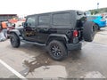 2011 Jeep Wrangler Unlimited — photo 3 of 17 | VIN 1J4BA7H10BL590322