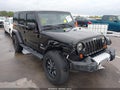 2011 Jeep Wrangler Unlimited — photo 6 of 17 | VIN 1J4BA7H10BL590322