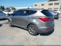 2014 Hyundai Santa Fe — photo 3 of 17 | VIN 5XYZTDLB1EG146699