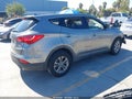 2014 Hyundai Santa Fe — photo 4 of 17 | VIN 5XYZTDLB1EG146699